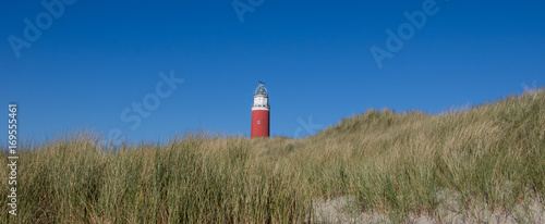 Lighthouse behind Dune banner background