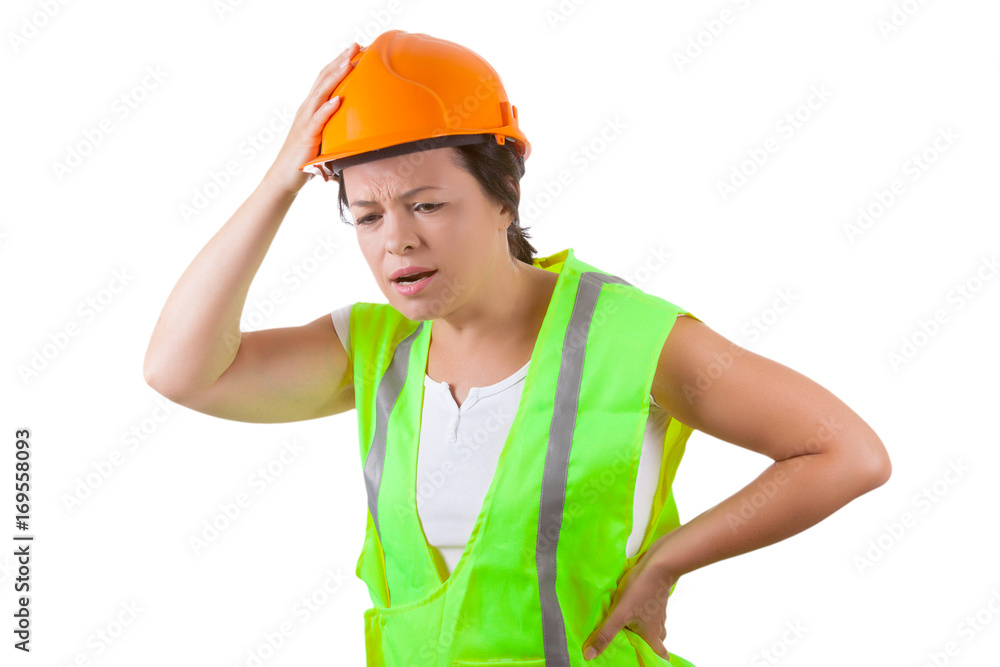 Attractive Woman Worker in Safety Jacket and Yellow Helmet Suffers from Backache