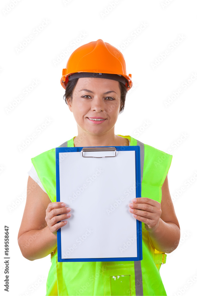 Attractive Woman Worker in Safety Jacket and Yellow Helmet Holding Clipboard with Blank Paper Attractive Woman Worker in Safety Jacket and Yellow Helmet Holding Clipboard with Blank Paper