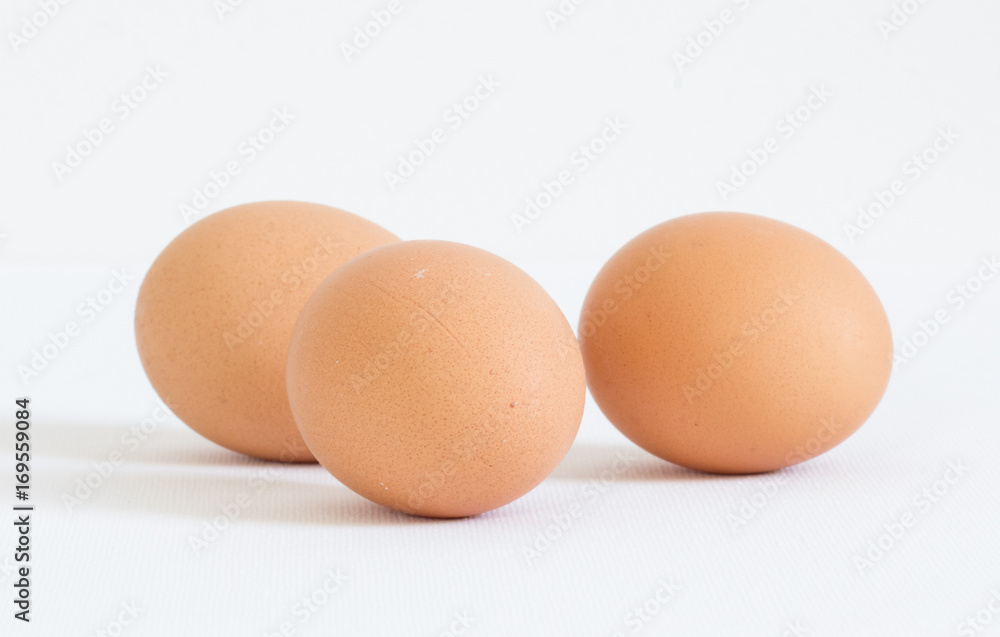 three eggs on white background three eggs on white background