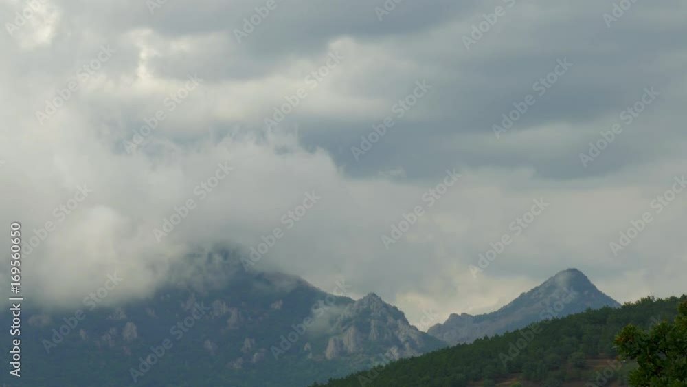 Clouds over blue mountains, time lapse / Rain clouds over mountains, time lapse Clouds over blue mountains, time lapse / Rain clouds over mountains, time lapse