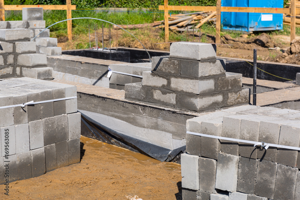 Brick up concrete blocks for foundation of a house Brick up concrete blocks for foundation of a house