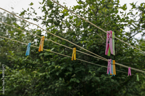 colorful clothespins on the rope