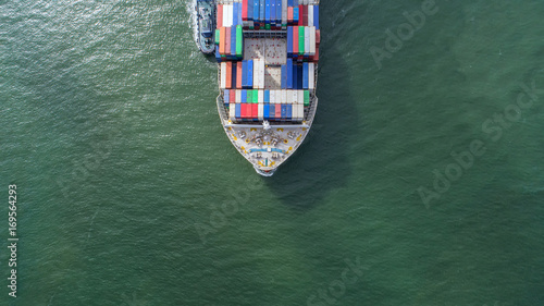 container,container ship in import export and business logistic,By crane,Trade Port , Shipping,cargo to harbor.Aerial view,Water transport,International,Shell Marine,transportation,logistic,trade,port © MAGNIFIER