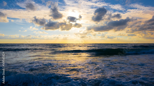 Waves at Lit-et-Mixe Beach at sunset