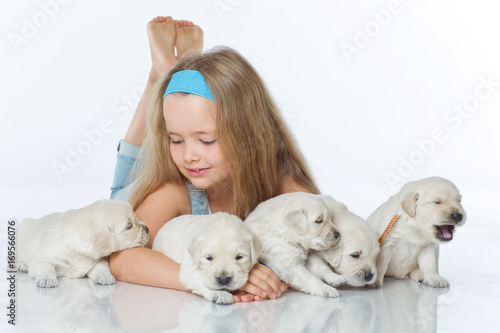 Girl with puppies 