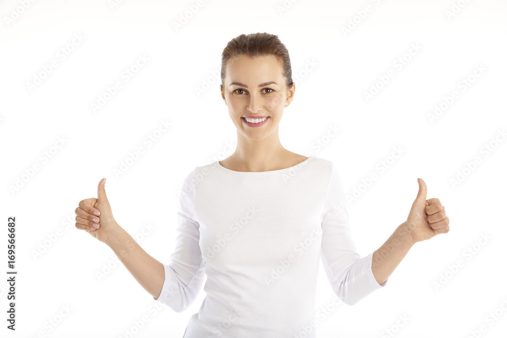 Thumbs up. Shot of a young businesswoman giving thumbs up while standing at isolated white background. Thumbs up. Shot of a young businesswoman giving thumbs up while standing at isolated white background.