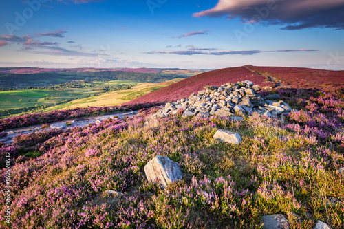 Cairn on Simonside Hills Ridge, popular with walkers and hikers they are covered with heather in summer, and are part of Northumberland National Park, overlooking the
Cheviot Hills photo