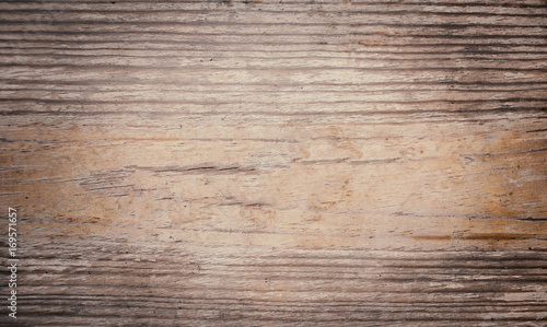 Vintage wooden textured background with natural pattern and scratches. Rustic dark surface with wood grainy texture. Old table top