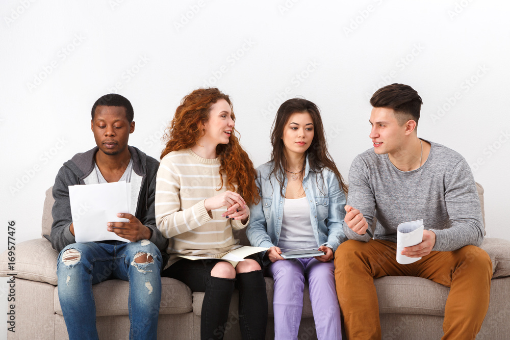 Diverse young students preparing for exam at home Diverse young students preparing for exam at home