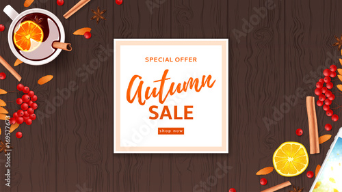 Autumn sale web banner divided on layers. Top view on composition with cup of mulled wine, rowan, cinnamon sticks on wooden texture. Vector illustration for for shopping sale.