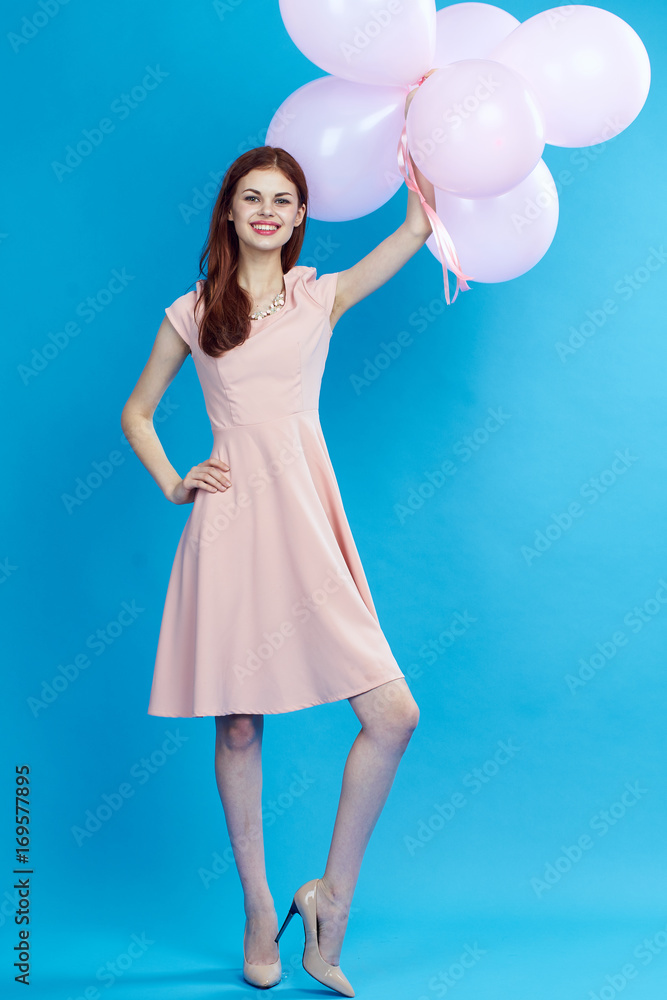beautiful smiling woman holding balloons beautiful smiling woman holding balloons