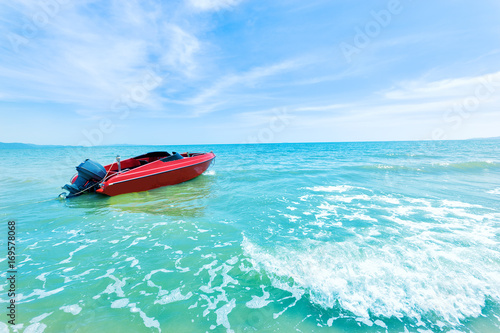 Blue sea and a jet ski floating on the sea, 
