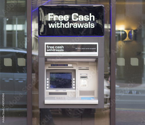 Automated teller machine placed in a glass wall