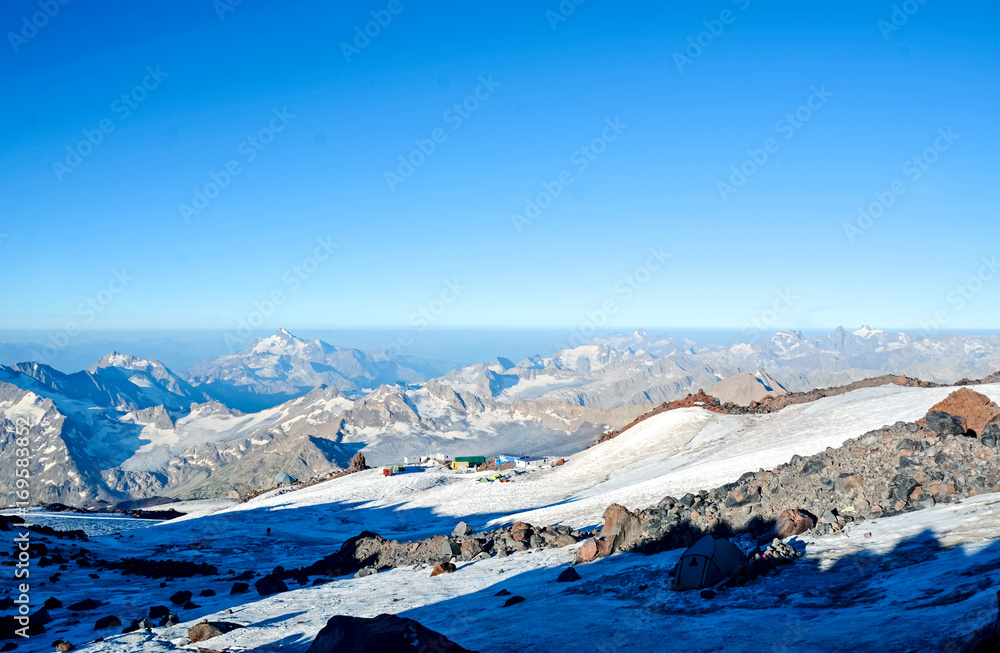 Snow covered Elbrus mountains at winter sunny day