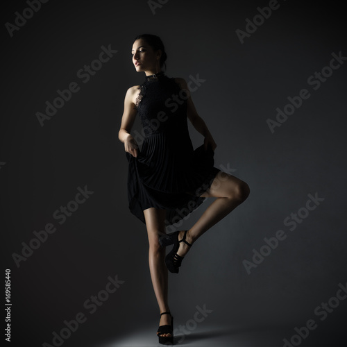 Elegant woman in black dress