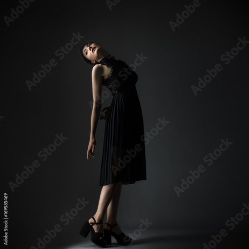 Elegant woman in black dress