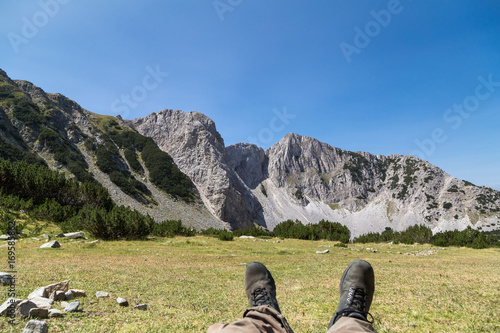 Man resting and enjoing of the view in the mountain