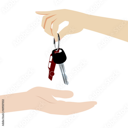 Hand gives car keys. buy, rent or lease a car
