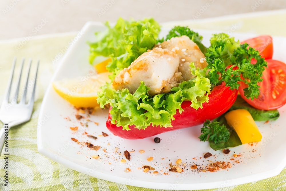 Fried fish with vegetable.