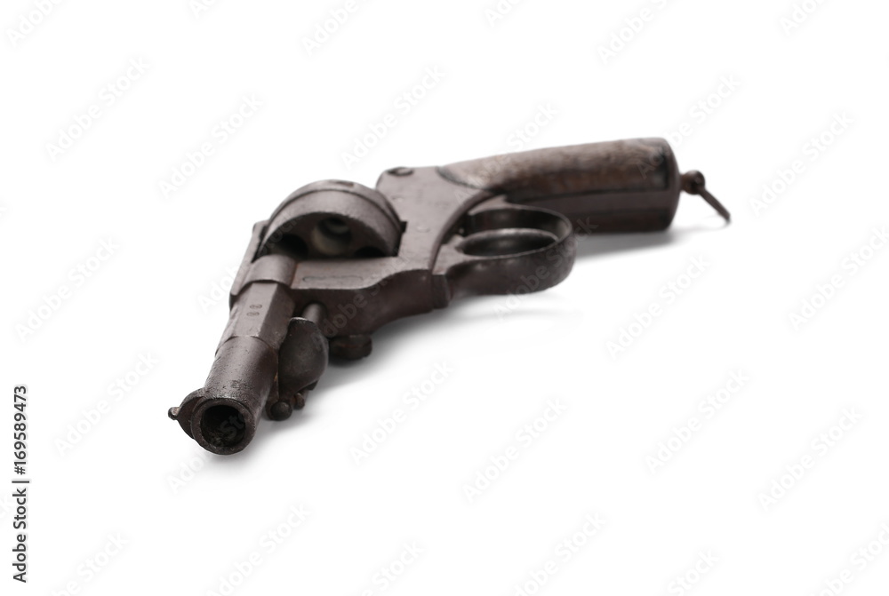 Old rusty Belgian Great War revolver, Nagant M1873, pistol isolated on white background