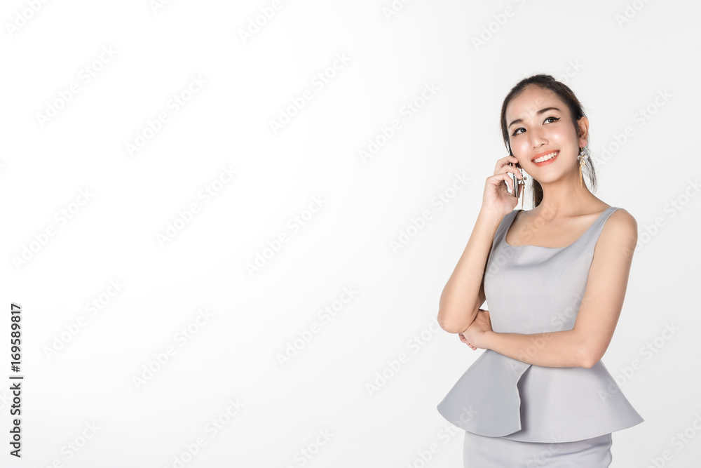 business woman talking on the mobile phone and smiling isolated on white background business woman talking on the mobile phone and smiling isolated on white background