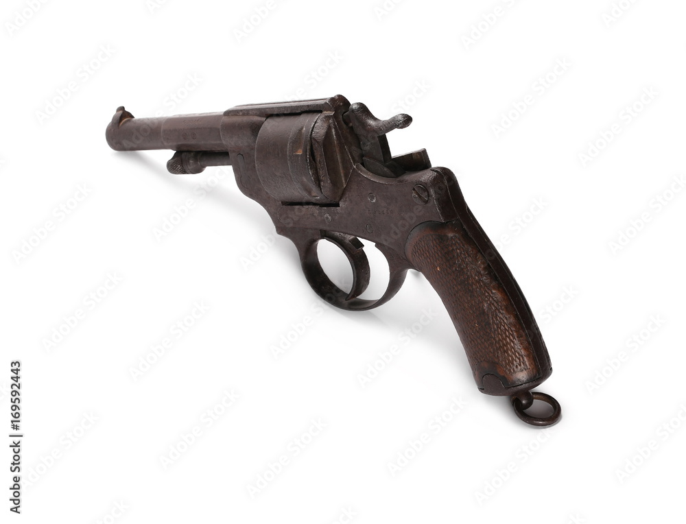Old rusty Belgian Great War revolver, Nagant M1873, pistol isolated on white background
