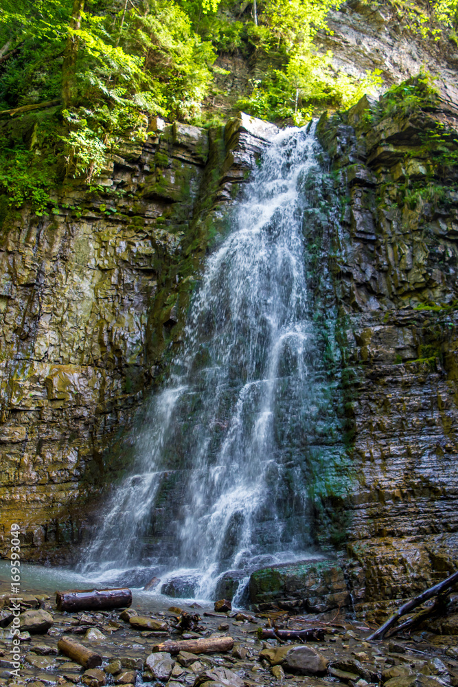 Obraz premium Photo of high waterfall in Carpathian mountains