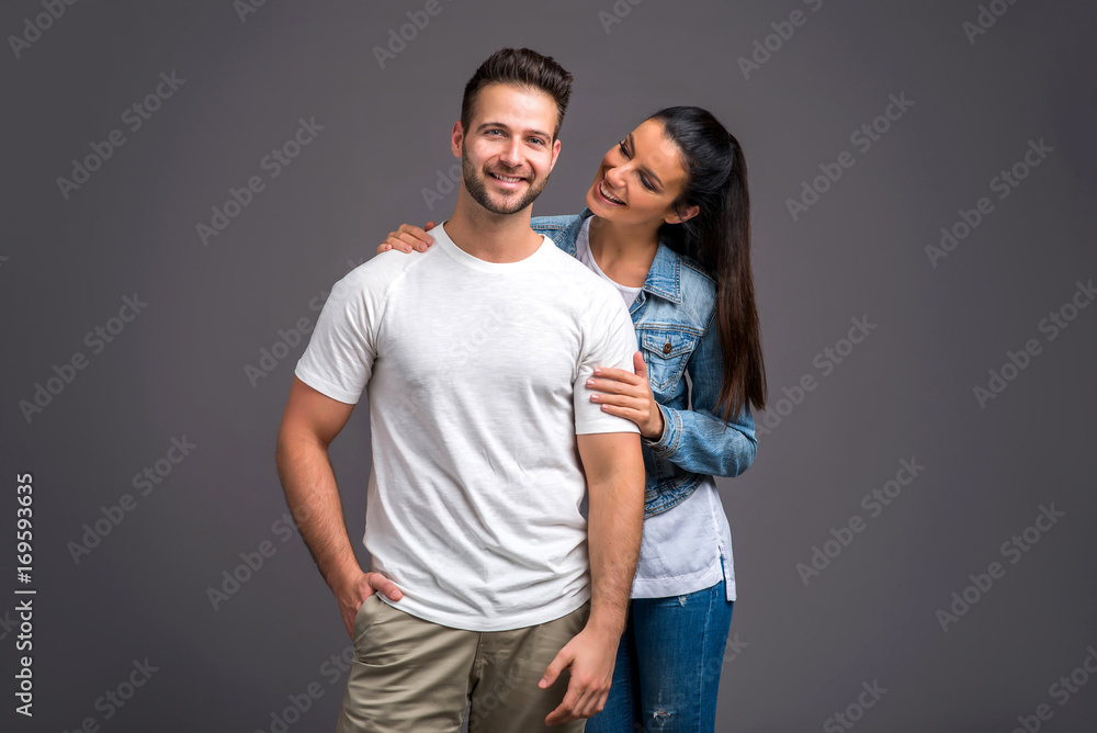 Nice young couple in the studio