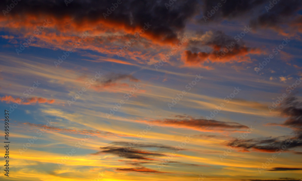 Photo of orange sunset with dark clouds on sky Photo of orange sunset with dark clouds on sky