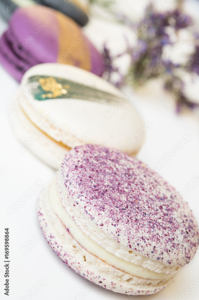 colorful macaroon cakes against white background colorful macaroon cakes against white background