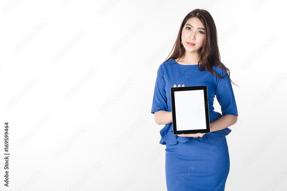 confident young business woman standing and holding blank screen digital tablet for present something on white background confident young business woman standing and holding blank screen digital tablet for present something on white background