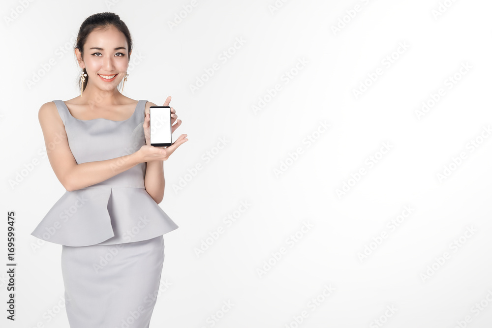 confident young business woman standing and holding blank screen digital tablet for present something on white background confident young business woman standing and holding blank screen digital tablet for present something on white background