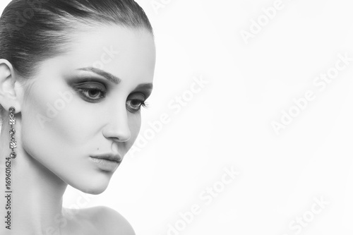 professional luxury female makeup on white background with copy space, monochrome
