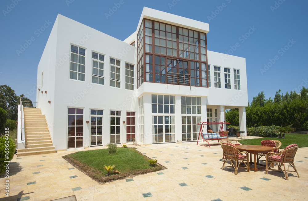 Fototapeta premium Swimming pool at at luxury tropical holiday villa