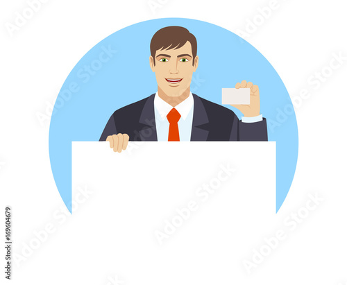 Businessman holding white blank poster and showing the business card