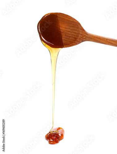 Wallpaper Mural Honey and wooden spoon isolated on white background Torontodigital.ca