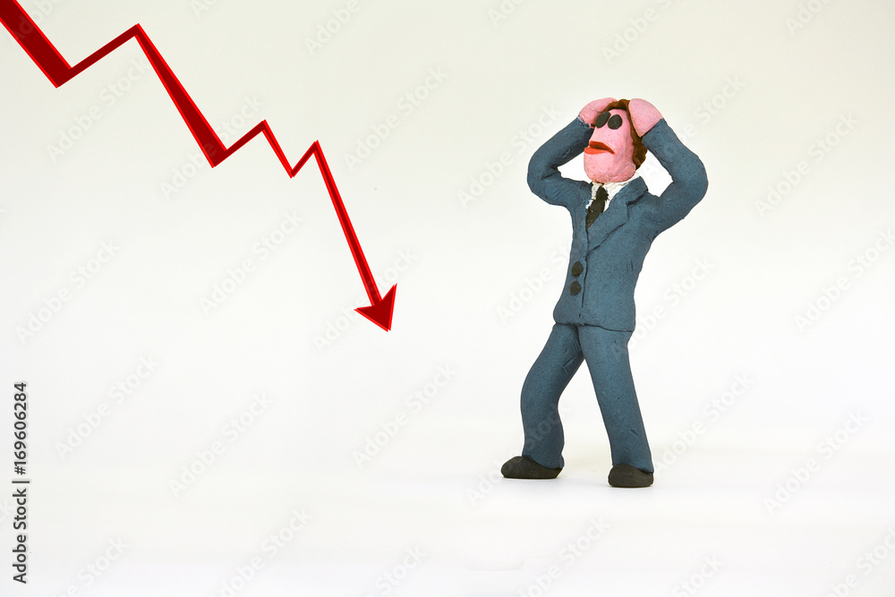 Fototapeta premium Excited business man with red chart arrow