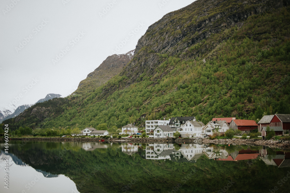 Calm mountain fjord reflections in Hjelle Norway Calm mountain fjord reflections in Hjelle Norway