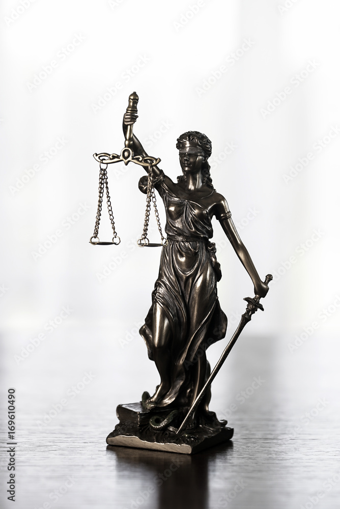 Legal law concept image. The Statue of Justice - lady justice or Iustitia Legal law concept image. The Statue of Justice - lady justice or Iustitia
