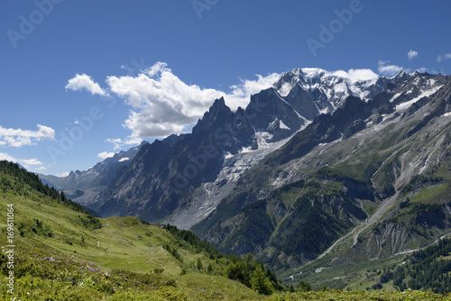 Mountain path overlooking Mont Blanc. Tour du Mont Blanc © Alex Serebrennikov