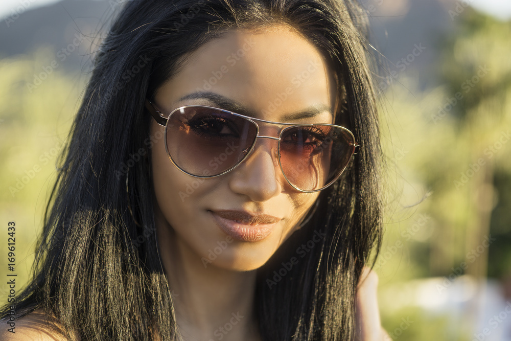 Beautiful woman wearing sunglasses Beautiful woman wearing sunglasses