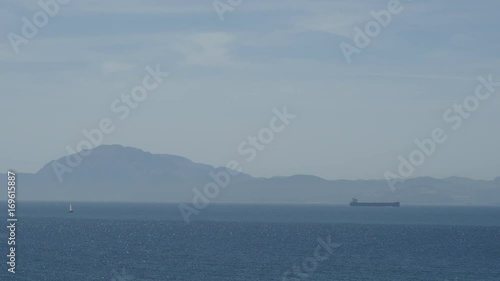 View of Morocco through the Strait of Gibraltar from observation deck of Tarifa city, Spain