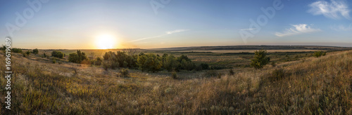 Beautiful sunrise on the hill in August. © Sannikov Dmitriy