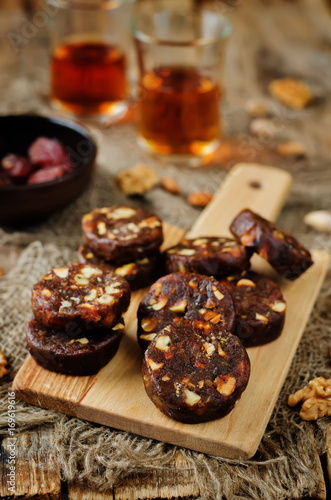 Dates and nuts roll. Indian sweets. Khajoor Katri