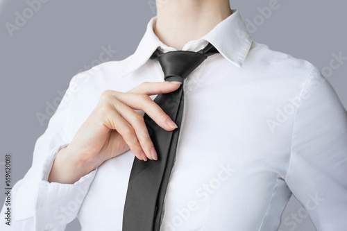 The hand with the tie