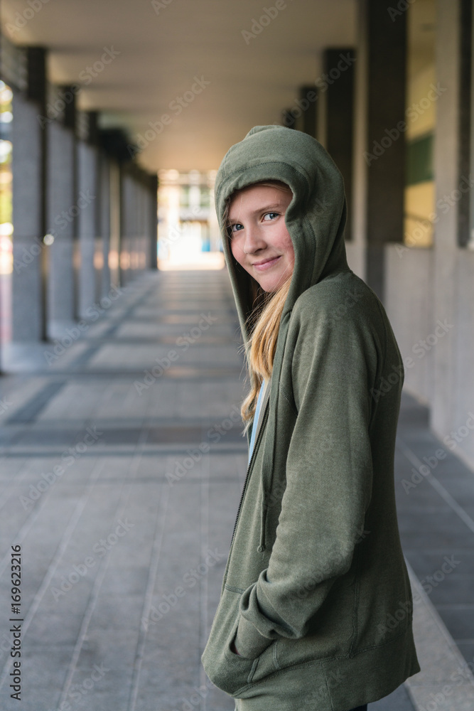 Portrait of teenage girl wearing hoodie Portrait of teenage girl wearing hoodie