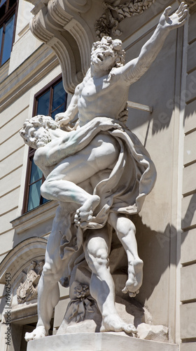 Vienna - Statue of Hercules fighting Antaeus from entry to Hofburg palaces photo