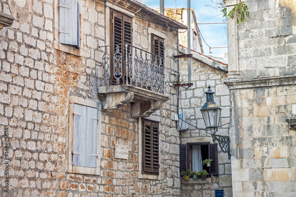 Stone Historical Building with balcony in Ancient Town Stari Grad in Croatian Island Hvar
