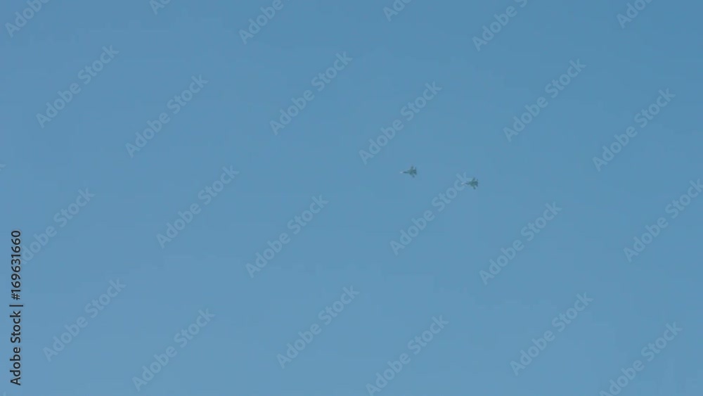 Military aircrafts fly over flowering fields Military aircrafts fly over flowering fields